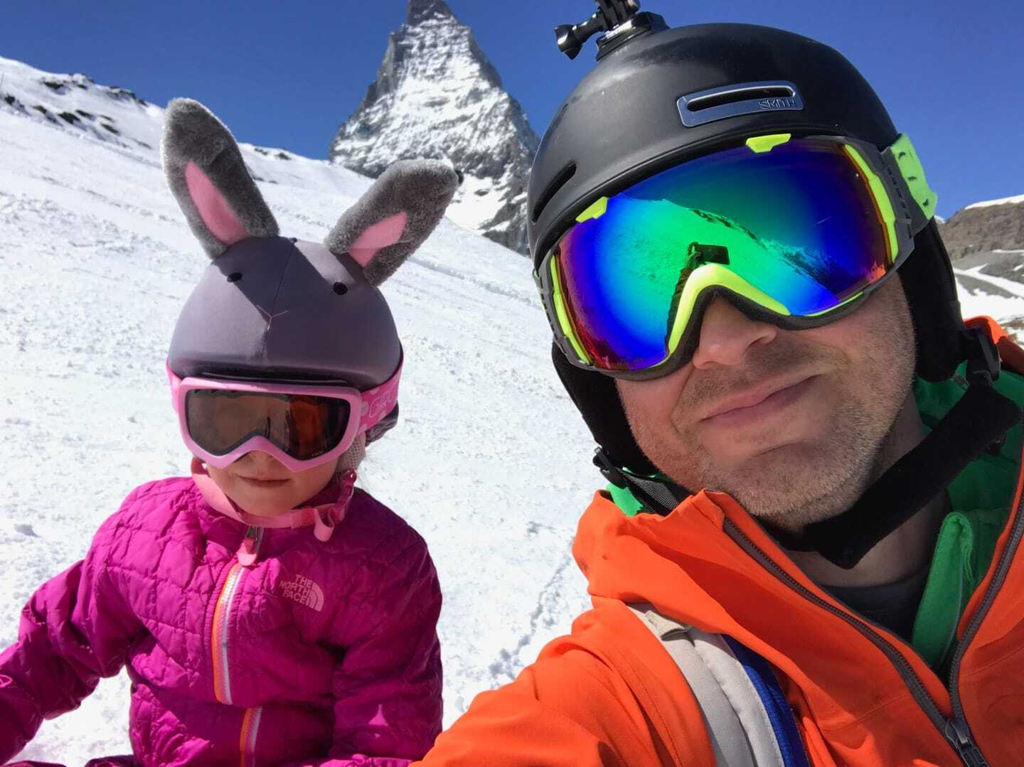 Father and daughter skiing