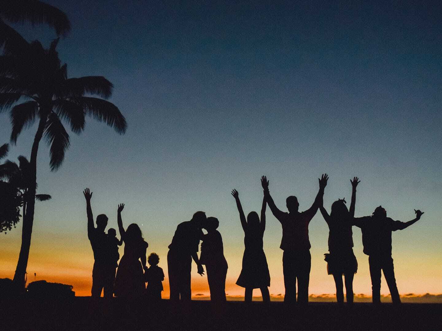 Silhouettes on the beach at sunset